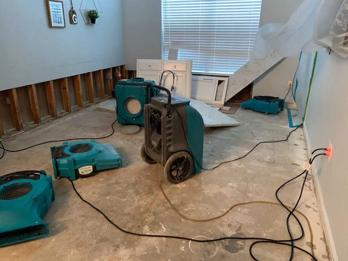 Dehumidifier in flood-cut room for Water Damage Restoration in Laurens